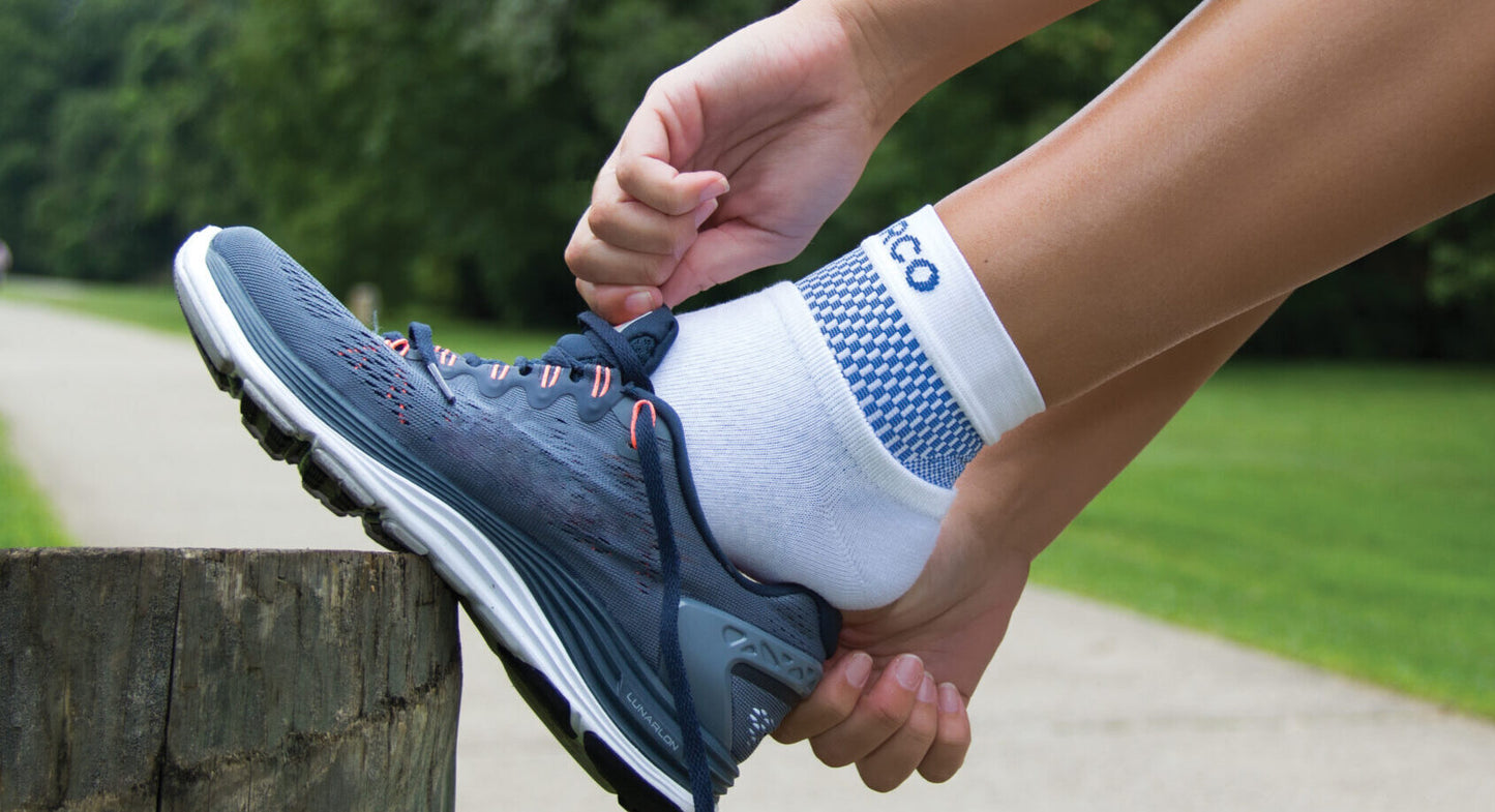 DARCO DCS Plantar Fasciitis Sleeve can be worn under socks to provide compressive support on-the-go.
