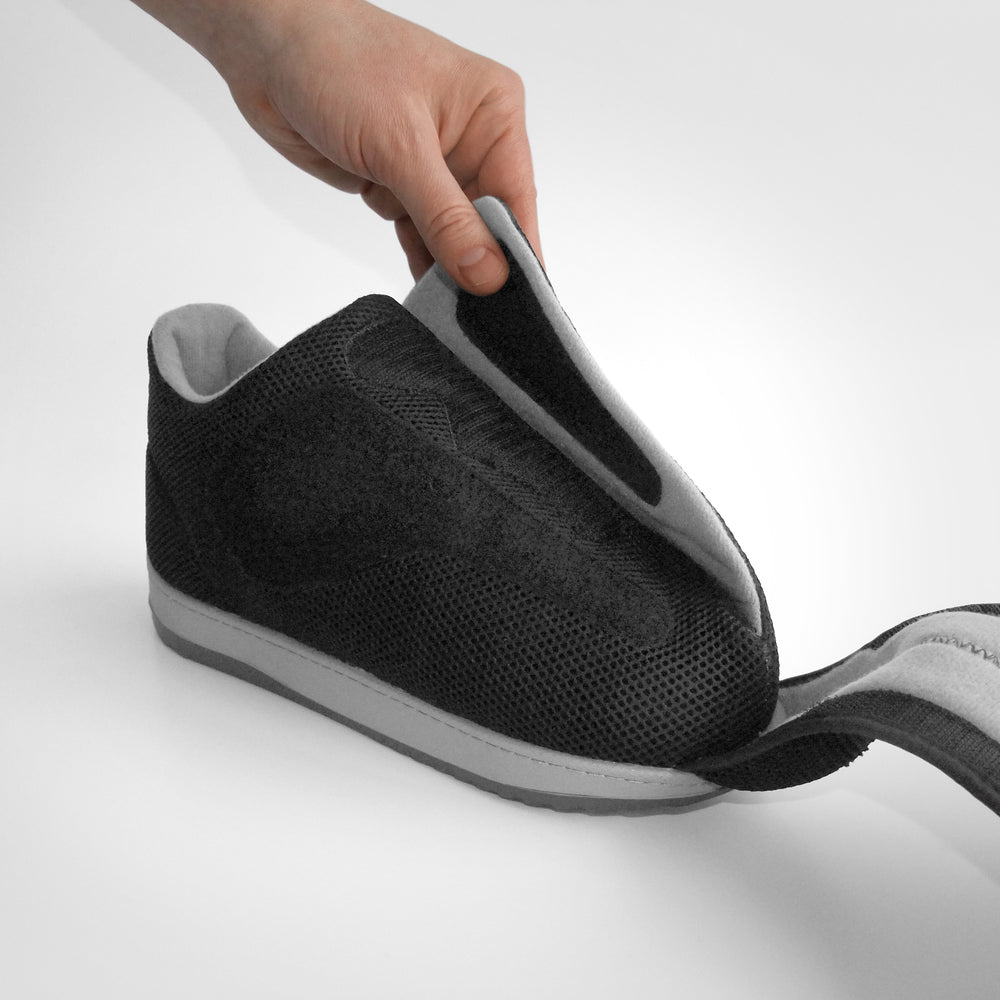 
                  
                    Image showing that the All Round Shoe by DARCO is fully accessible and easy to put on
                  
                