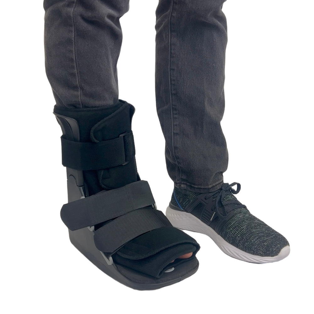 
                  
                    Patient wearing short non-air walking boot during recovery
                  
                