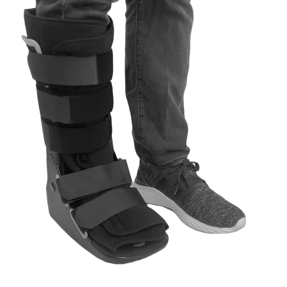 Patient wearing FX Pro CAM Walker with athletic shoe