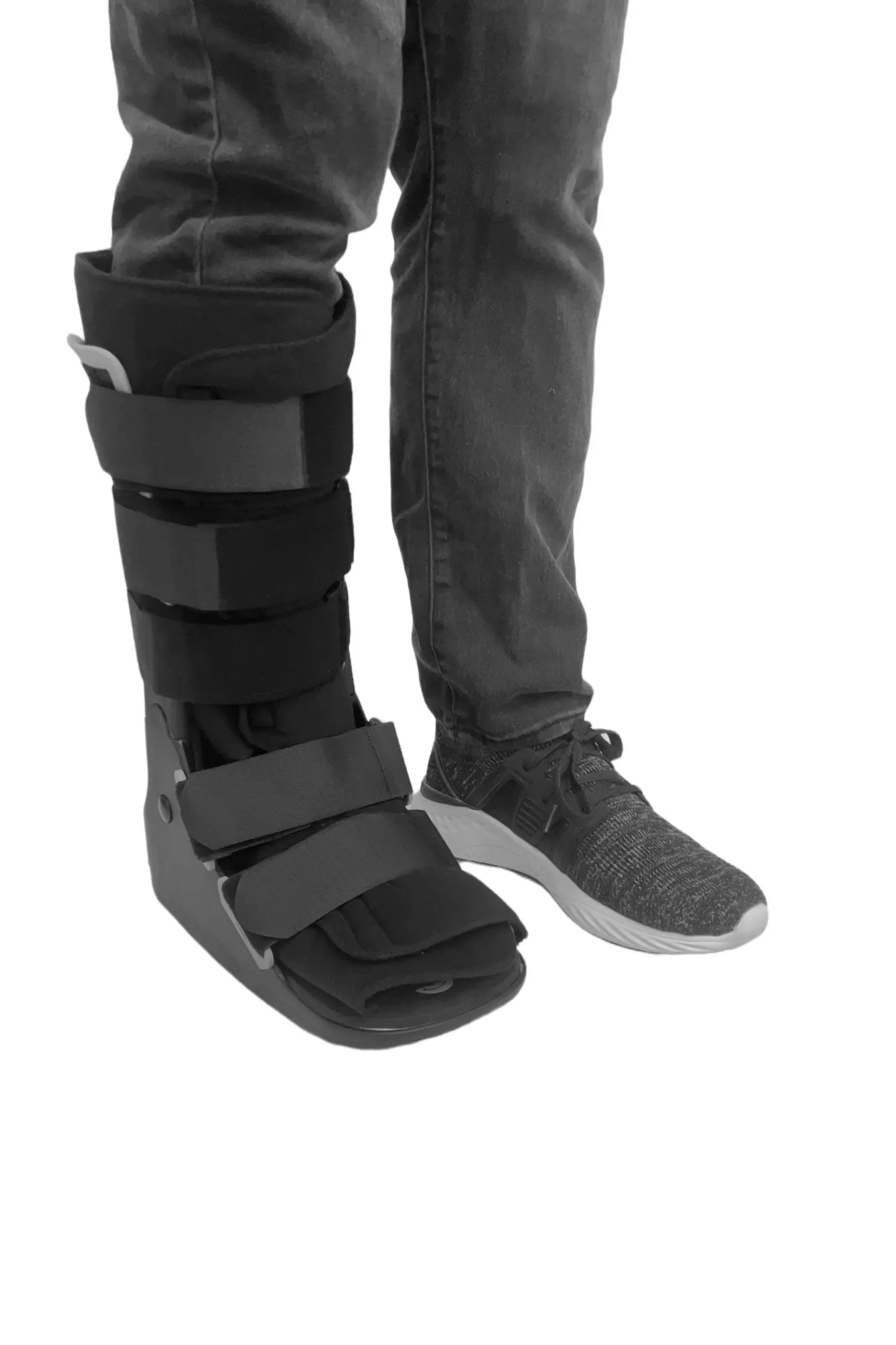 Patient wearing FX Pro CAM Walker with athletic shoe